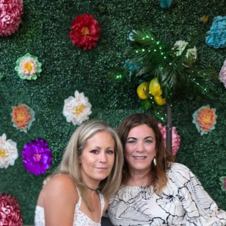 Meghan Snatchko and Kim Celento in a casual portrait, representing the local hosting team for Stay In Pittsburgh and GetLostPGH.