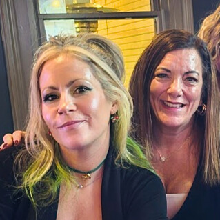 Meghan Snatchko of GetLostPGH (left) and Kim Celento of National Corporate Housing (right), the team providing luxury furnished rentals for the 2026 NFL Draft in Pittsburgh.